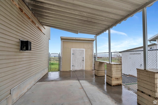 view of patio / terrace featuring a gate and fence
