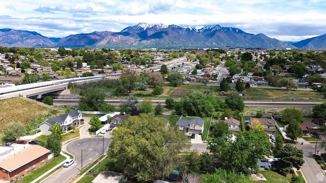 aerial view of residential area with a mountainous background