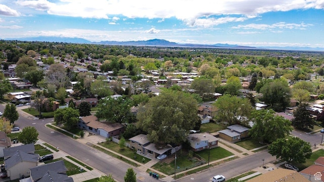 aerial overview of property's location with nearby suburban area and mountains