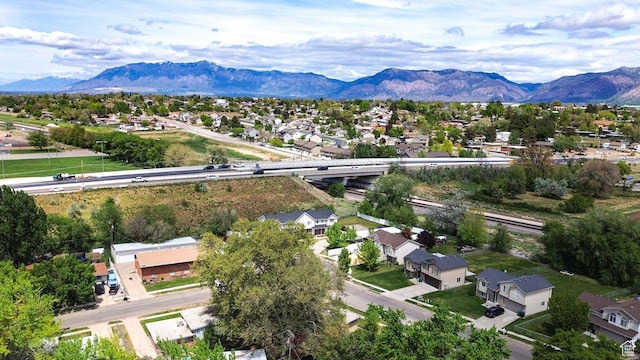 aerial view of residential area with mountains