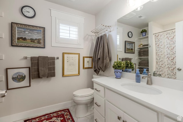 11243 S Prosperity Rd, South Jordan, UT 84009 - full bath with vanity, plenty of natural light, toilet, and baseboards