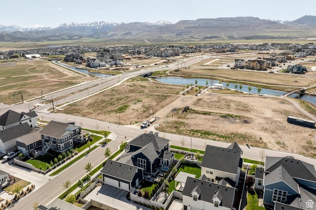 11243 S Prosperity Rd, South Jordan, UT 84009 - aerial view of residential area featuring a water and mountain view