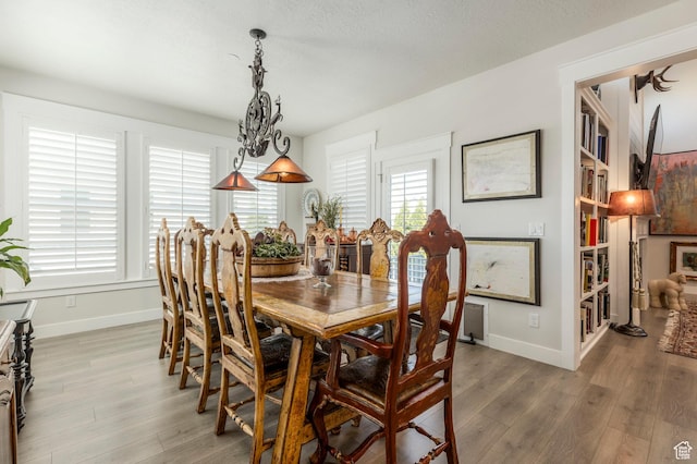 11243 S Prosperity Rd, South Jordan, UT 84009 - dining space with wood finished floors and baseboards