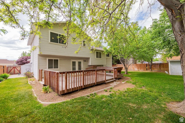 back of property featuring a wooden deck