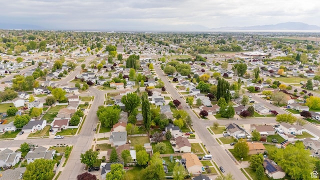 view of property location with nearby suburban area and a mountainous background