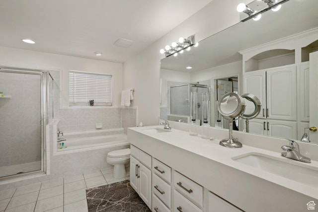 full bathroom with a shower stall, a garden tub, double vanity, recessed lighting, and tile patterned floors