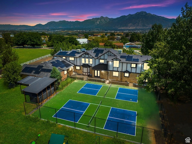 view of subject property with mountains