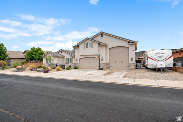2883 S 3640 W, Hurricane, UT 84737 - traditional-style house featuring stucco siding, stone siding, and driveway