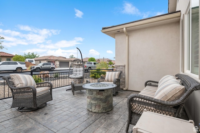2883 S 3640 W, Hurricane, UT 84737 - view of patio / terrace featuring an outdoor fire pit and a residential view