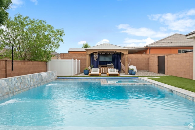 2883 S 3640 W, Hurricane, UT 84737 - view of swimming pool featuring a gazebo, a fenced backyard, a pool with connected hot tub, and outdoor lounge area
