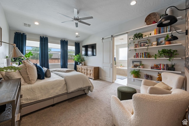 2883 S 3640 W, Hurricane, UT 84737 - carpeted bedroom with multiple windows, a barn door, recessed lighting, lofted ceiling, and connected bathroom