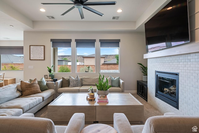 2883 S 3640 W, Hurricane, UT 84737 - carpeted living room featuring ceiling fan, healthy amount of natural light, a fireplace, and recessed lighting