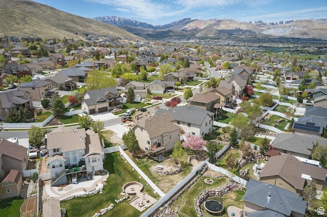 14349 S Round Rock Dr, Herriman, UT 84096 - aerial overview of property's location featuring nearby suburban area and a mountain backdrop