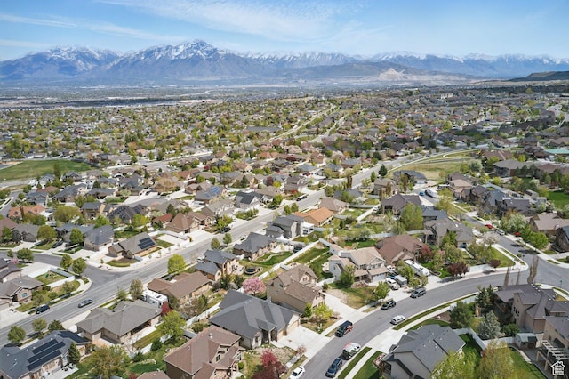 14349 S Round Rock Dr, Herriman, UT 84096 - aerial overview of property's location with a mountainous background and nearby suburban area