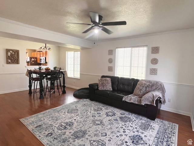 354 E 950 S, Payson, UT 84651 - living area featuring a ceiling fan, a chandelier, wood finished floors, ornamental molding, and a textured ceiling