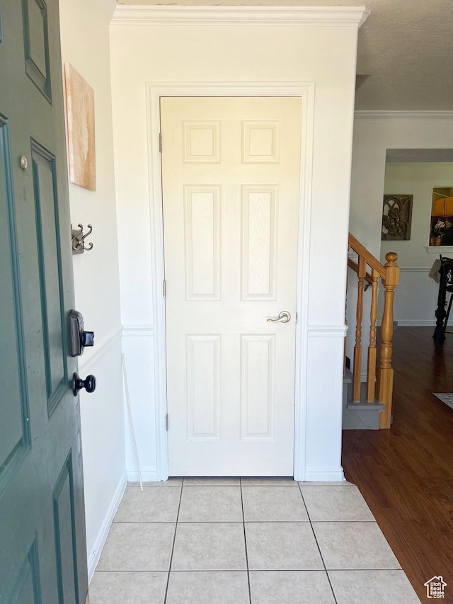 354 E 950 S, Payson, UT 84651 - entrance foyer featuring crown molding, light tile patterned flooring, stairs, and baseboards