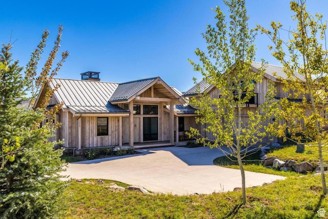 7485 E Moon Light Dr, Heber City, UT 84032 - view of front facade with a standing seam roof, metal roof, and board and batten siding