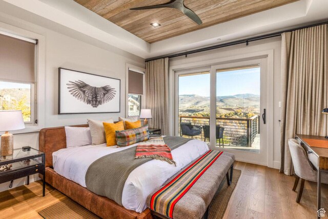 7485 E Moon Light Dr, Heber City, UT 84032 - bedroom with a raised ceiling, wooden ceiling, access to exterior, multiple windows, and recessed lighting