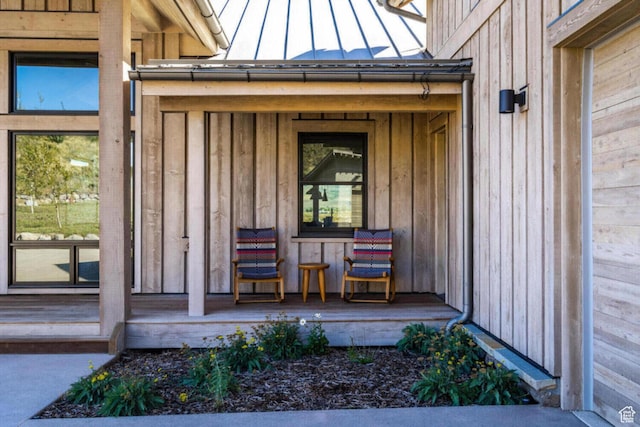 7485 E Moon Light Dr, Heber City, UT 84032 - property entrance featuring board and batten siding, a standing seam roof, and metal roof