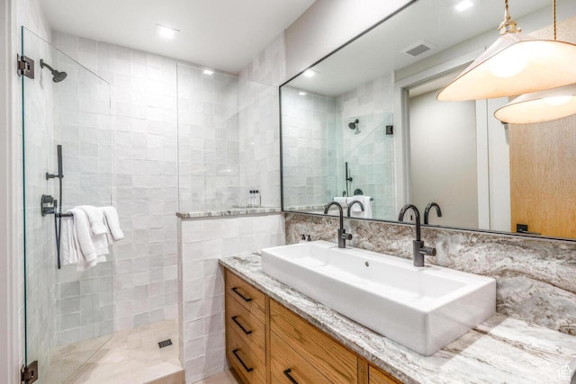 7485 E Moon Light Dr, Heber City, UT 84032 - full bath with tile walls, a stall shower, and vanity