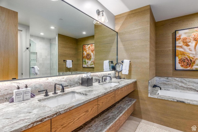 7485 E Moon Light Dr, Heber City, UT 84032 - full bathroom with double vanity, a garden tub, tile patterned floors, and recessed lighting