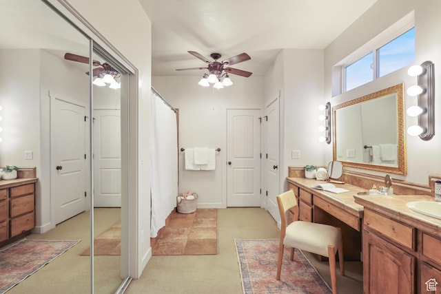 bathroom with a ceiling fan, vanity, and a shower with shower curtain