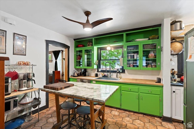 162 E Cleveland, Salt Lake City, UT 84115 - kitchen with a sink, a ceiling fan, light tile patterned floors, and stainless steel microwave
