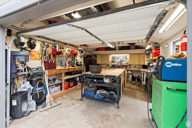 162 E Cleveland, Salt Lake City, UT 84115 - garage featuring a workshop area