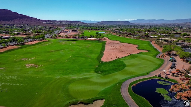 2255 N Tuweap Dr Unit 50, St George, UT 84770 - aerial perspective of suburban area featuring a golf course and a water and mountain view