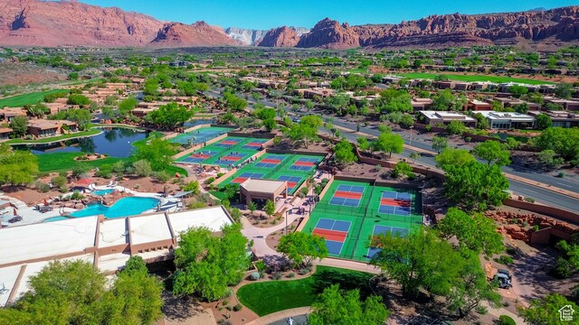 2255 N Tuweap Dr Unit 50, St George, UT 84770 - drone / aerial view of a mountainous background and a pool area