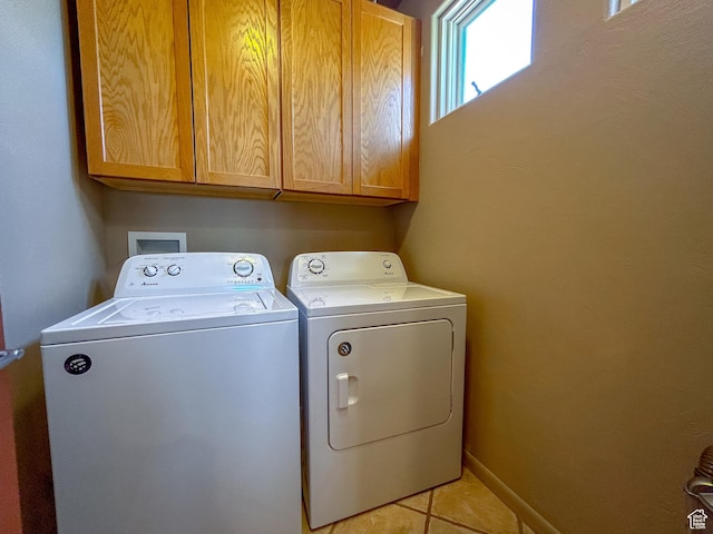 2255 N Tuweap Dr Unit 50, St George, UT 84770 - laundry room featuring cabinet space, washer and clothes dryer, and light tile patterned floors