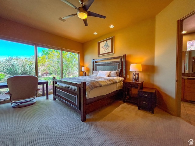 2255 N Tuweap Dr Unit 50, St George, UT 84770 - bedroom featuring light colored carpet, recessed lighting, and a ceiling fan