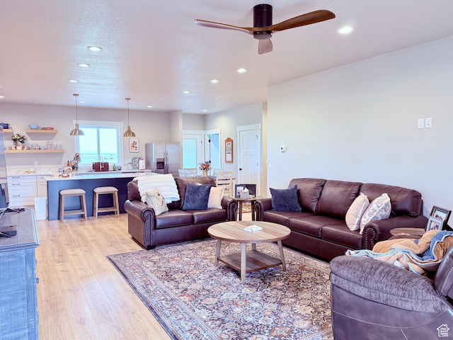 295 E 2nd N, Paris, ID 83261 - living room featuring a ceiling fan, light wood finished floors, and recessed lighting