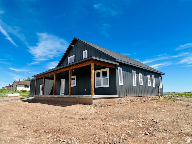 295 E 2nd N, Paris, ID 83261 - view of side of property with board and batten siding and covered porch