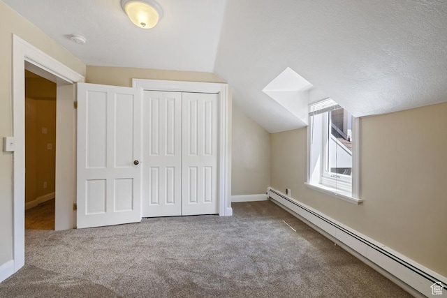 105 S 500 E, Salem, UT 84653 - additional living space featuring a baseboard radiator, carpet flooring, vaulted ceiling, and baseboards