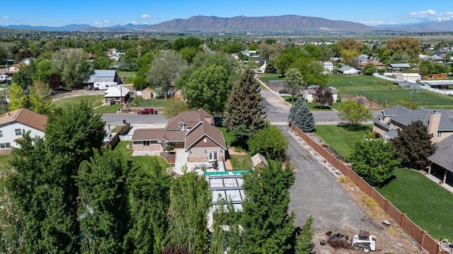 105 S 500 E, Salem, UT 84653 - aerial view of property and surrounding area with nearby suburban area and a mountain backdrop