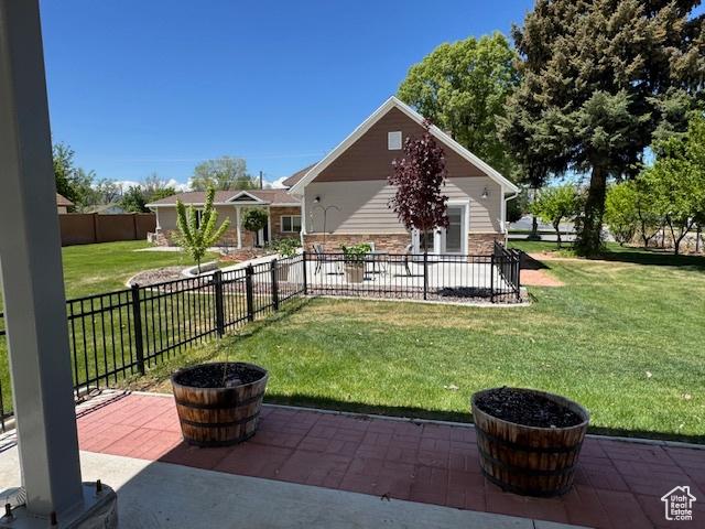 105 S 500 E, Salem, UT 84653 - rear view of house with a patio area and stone siding
