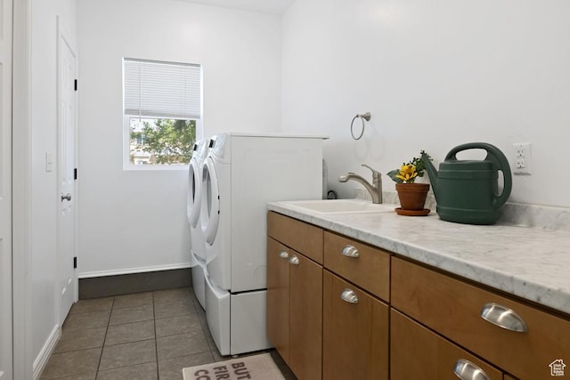 105 S 500 E, Salem, UT 84653 - laundry room featuring washing machine and clothes dryer, tile patterned floors, baseboards, and cabinet space