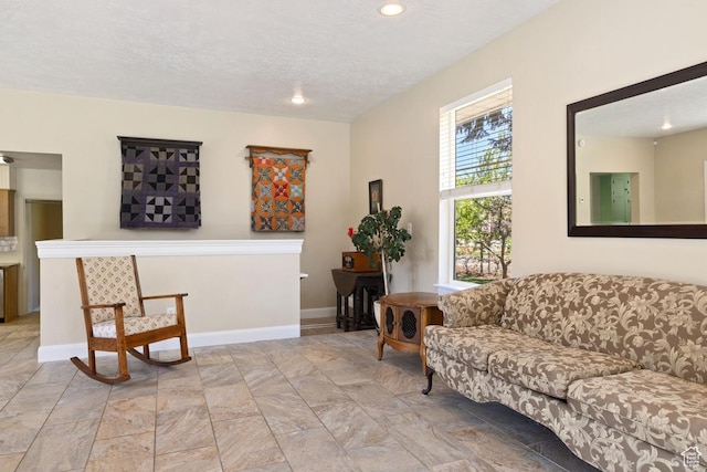 105 S 500 E, Salem, UT 84653 - living room with baseboards, a textured ceiling, and recessed lighting