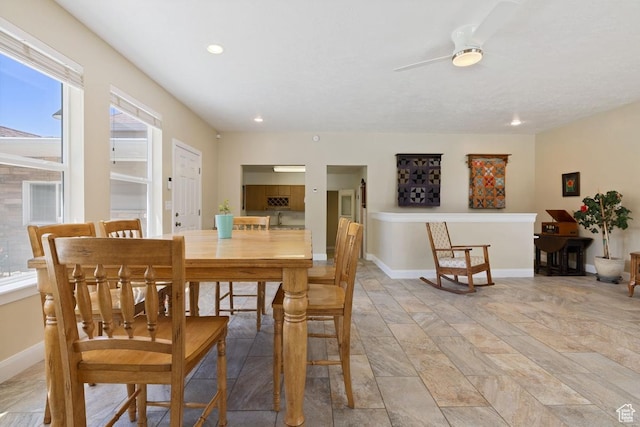 105 S 500 E, Salem, UT 84653 - dining room featuring a ceiling fan, baseboards, light stone finish floors, and recessed lighting