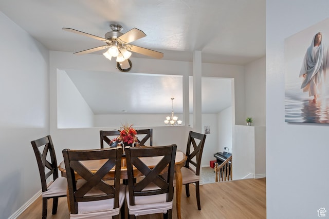 228 W 470 S, American Fork, UT 84003 - dining area featuring light wood-style floors, a chandelier, ceiling fan, and baseboards