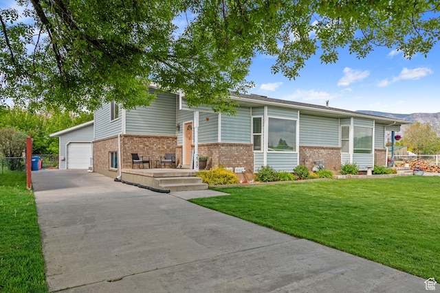 228 W 470 S, American Fork, UT 84003 - view of front of home with brick siding and driveway