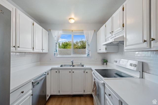 228 W 470 S, American Fork, UT 84003 - kitchen featuring white electric range oven, a sink, dishwasher, under cabinet range hood, and white cabinets
