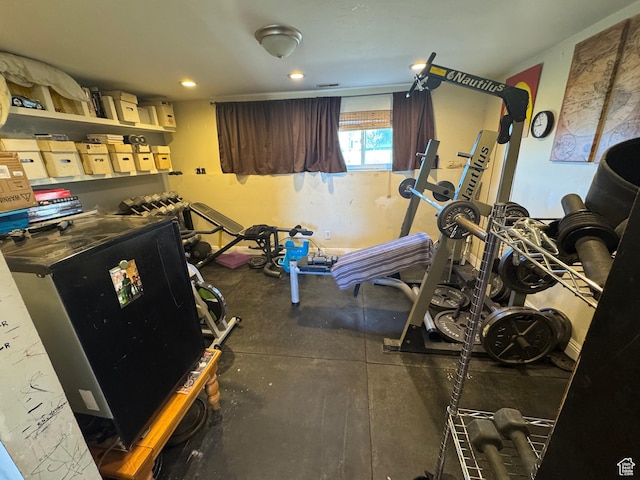 workout area with recessed lighting