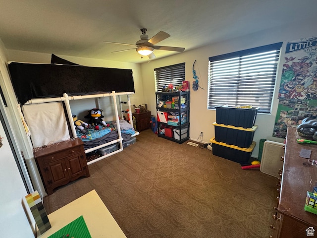 bedroom featuring carpet floors and a ceiling fan