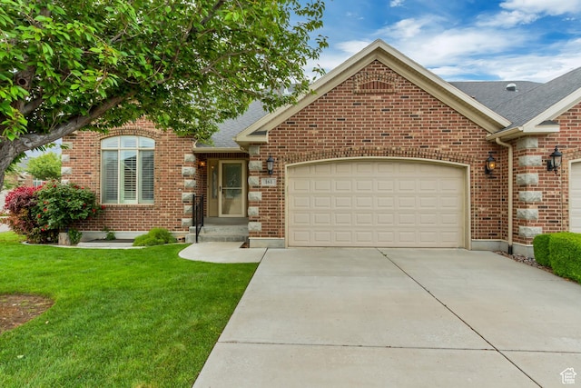 161 S 980 E, American Fork, UT 84003 - view of front facade featuring driveway, brick siding, a garage, a front lawn, and roof with shingles