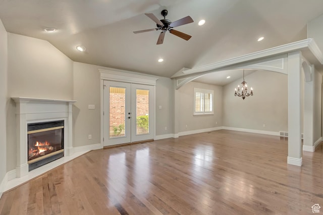 161 S 980 E, American Fork, UT 84003 - unfurnished living room with lofted ceiling, a glass covered fireplace, french doors, wood finished floors, and ceiling fan