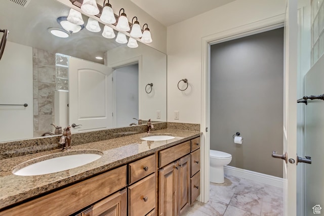 161 S 980 E, American Fork, UT 84003 - bathroom featuring marble look tile flooring, toilet, double vanity, and baseboards