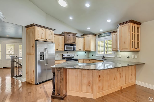 161 S 980 E, American Fork, UT 84003 - kitchen featuring stainless steel appliances, dark stone countertops, light brown cabinets, a peninsula, and lofted ceiling