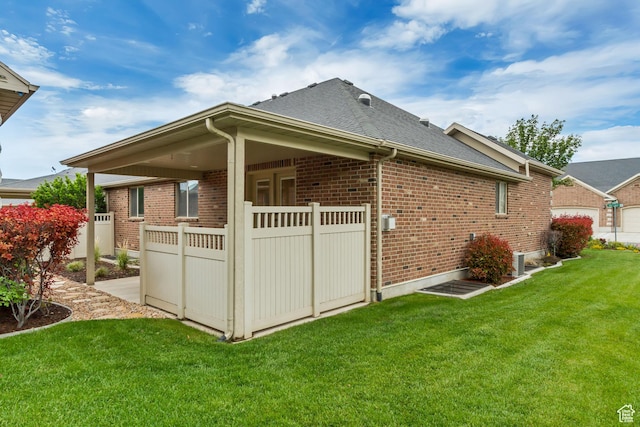 161 S 980 E, American Fork, UT 84003 - view of property exterior with brick siding and roof with shingles